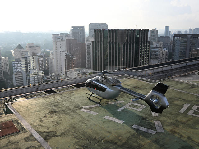 ACH145 Helicopter on a roof helipad in Sao Paulo, Brazil